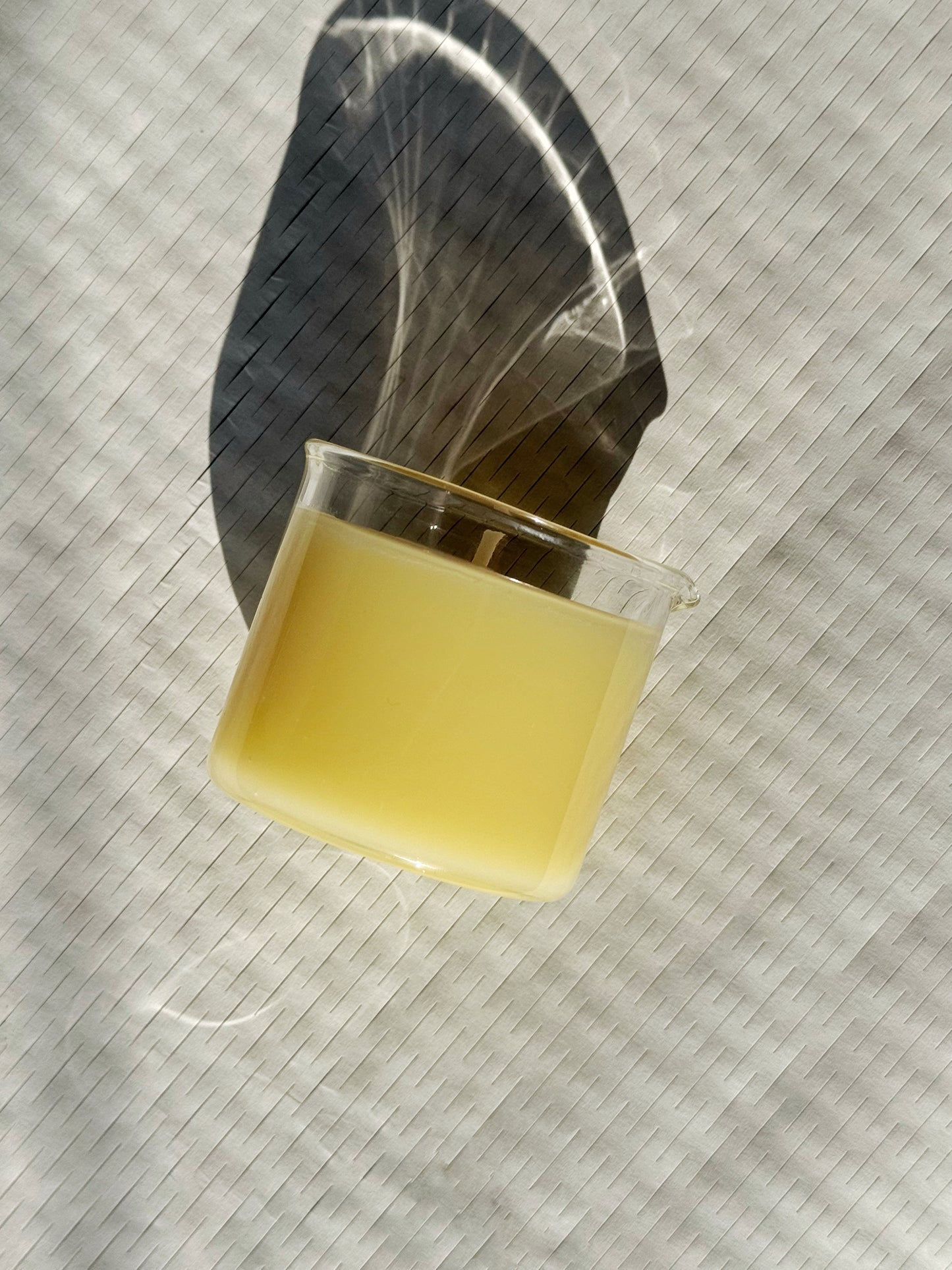 massage candle on its side