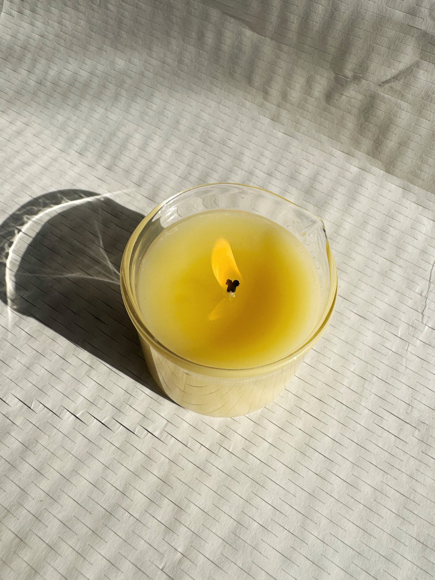 A burning massage candle